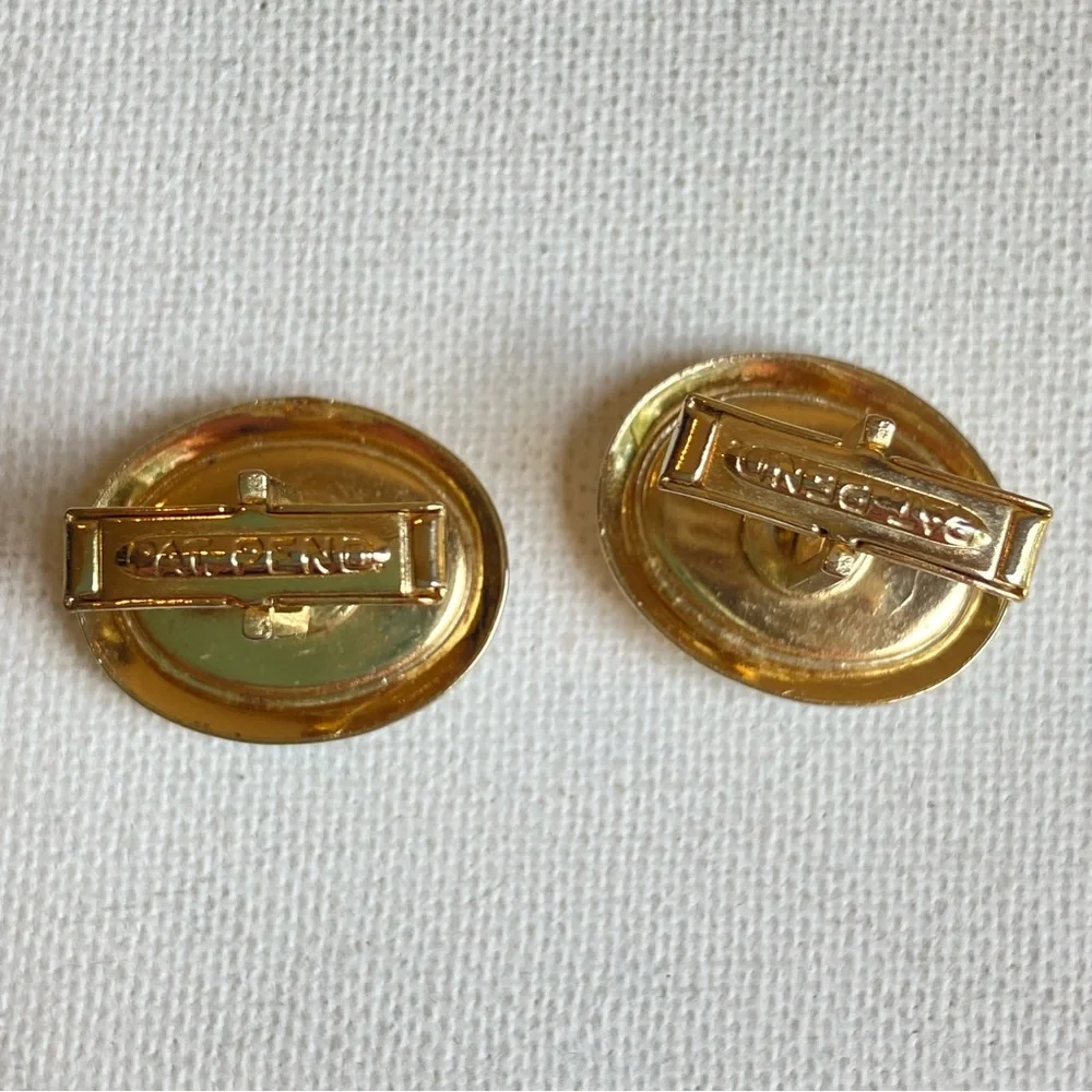 White porcelain cuff links in goldtone vintage with crosses marked Pat Pending